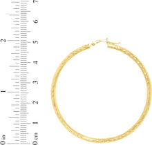 Load image into Gallery viewer, 10k Yellow Gold 2.5mm Diamond Cut Round Tube Hoop Earrings
