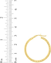 Load image into Gallery viewer, 10k Yellow Gold 2.5mm Diamond Cut Round Tube Hoop Earrings
